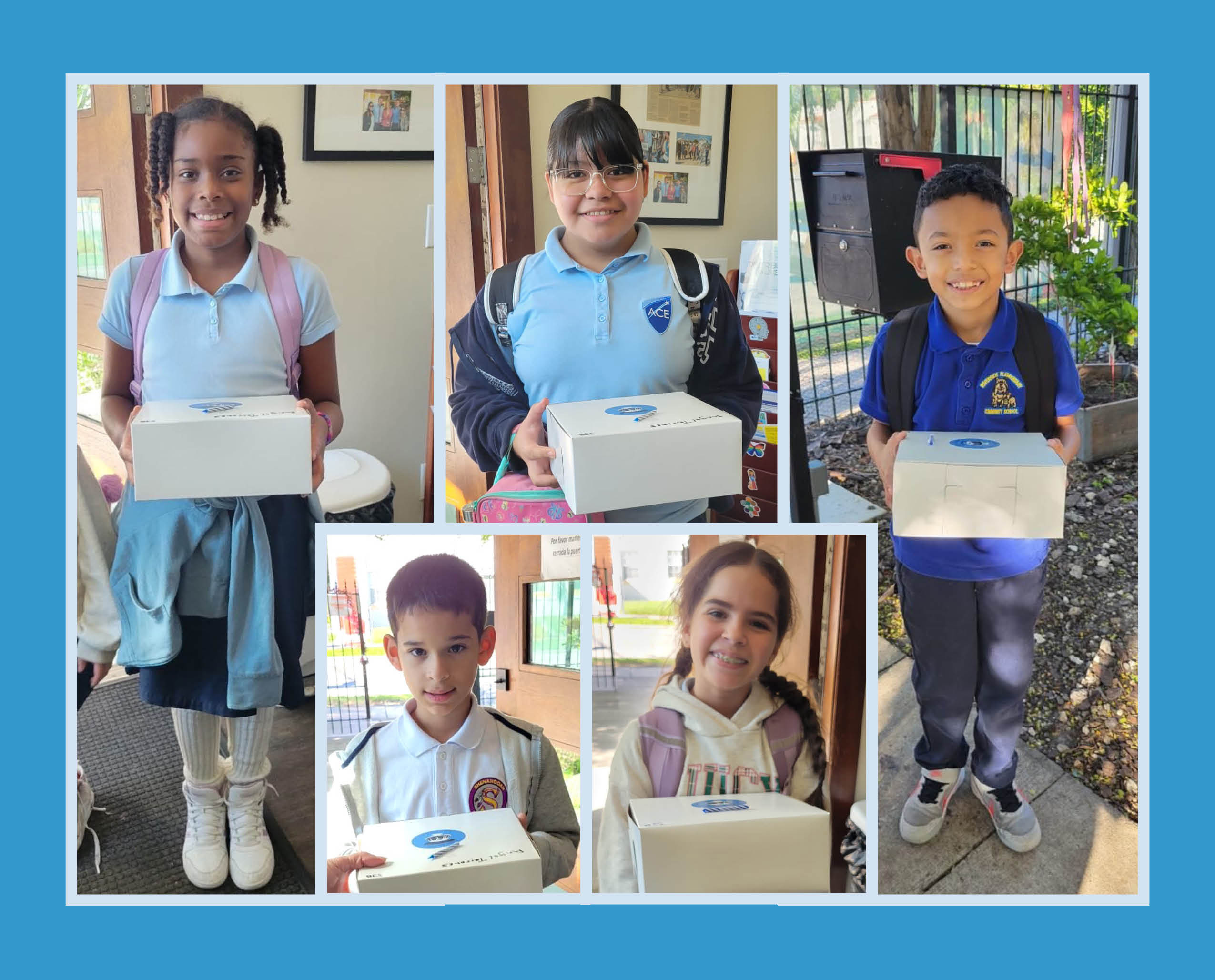 Happy children holding their Bake-A-Wish cake boxes